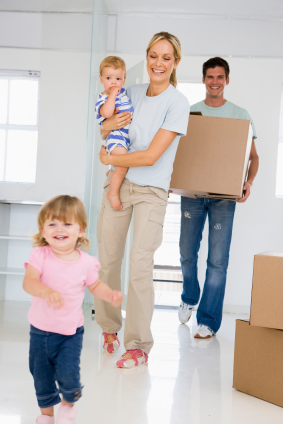 Young Family Moving Into New Home